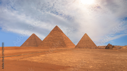 Giza Pyramid Complex at sunset - Cairo, Egypt 