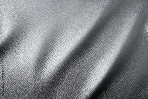  a black and white photo of a leather textured upholstered upholstered upholstered upholstered upholstered upholstered upholstered upholstered upholstered upholstered upholstered upholster.