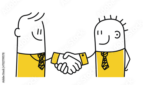 Two business people shaking hands.