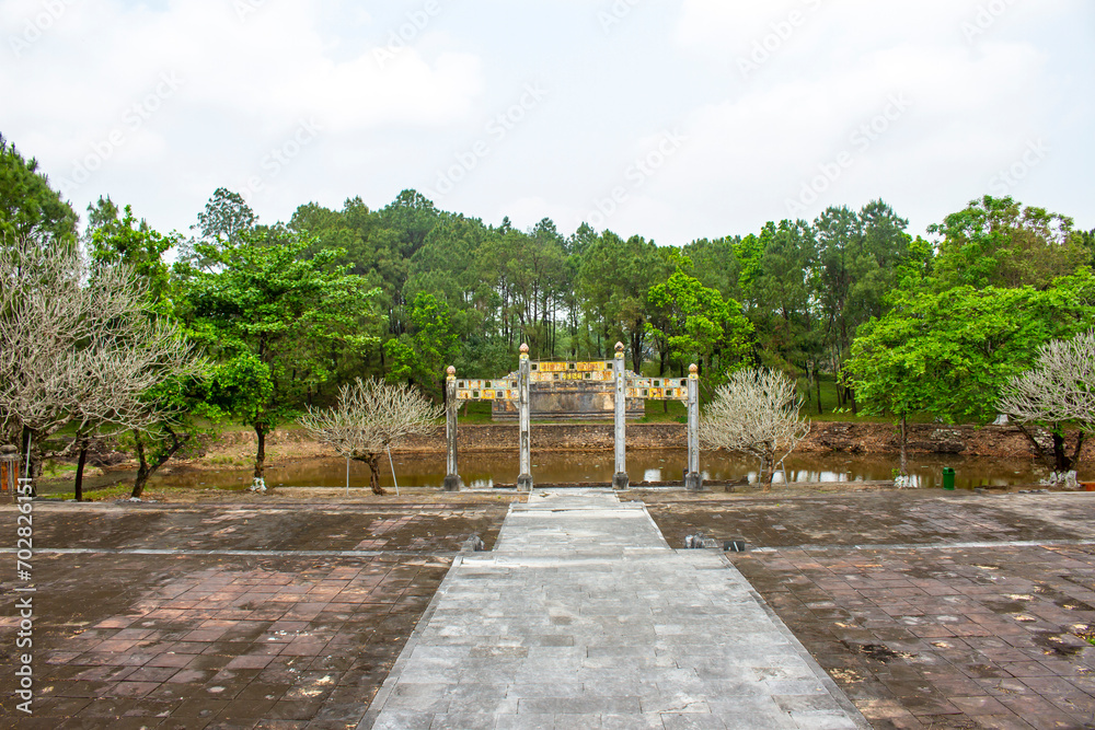 Traditional Copper Gate And Lake At Mausoleum Of Thieu Tri Emperor In Hue, Vietnam. Mausoleum Of Thieu Tri Emperor Is One Of The Famous Royal Tombs Of The Nguyen Dynasty.