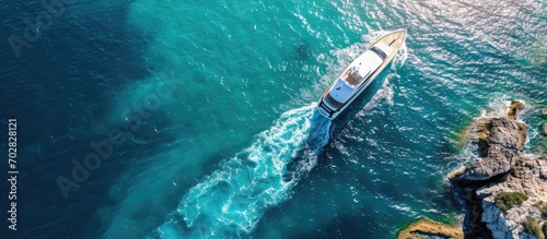 Large white boat on blue wa...