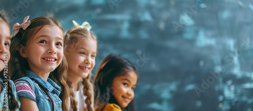 Happy diverse schoolgirls s...