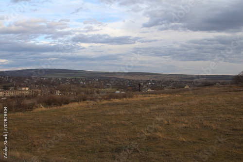 A landscape with a city in the distance