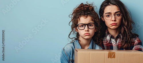 Mother and daughter moving ...