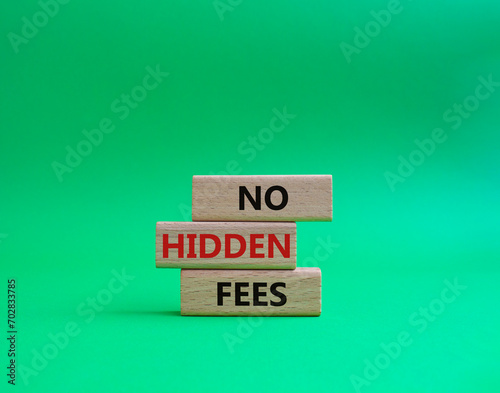 No Hidden Fees symbol. Concept words No Hidden Fees on wooden blocks. Beautiful green background. Business and No Hidden Fees concept. Copy space.