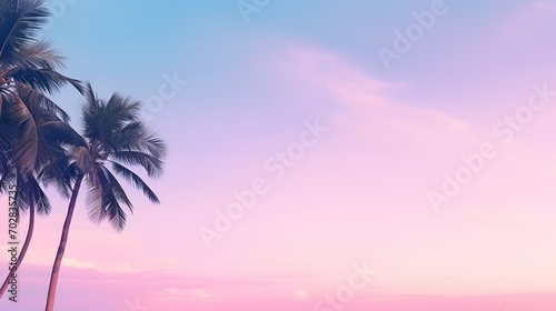 Green coconut palm trees on summer colorful pink sky with copy space. Beautiful tropical seascape background minimal style. © Ziyan Yang