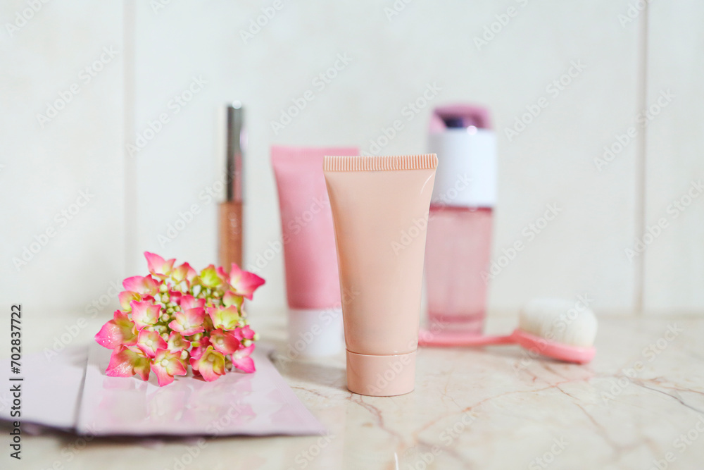 Face cream, serum, lotion, moisturizer and face oil among hydrangea Face cream, serum, lotion, moisturizer and face oil among hydrangea
