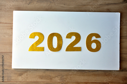 2026 dourado em fundo branco , ano novo  photo