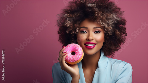 african american woman holding donut isolated on pink background, junk unhealthy food diet concept copy space, Valentine day, sweet tasty life, Valentine day, International Women day, 8 March