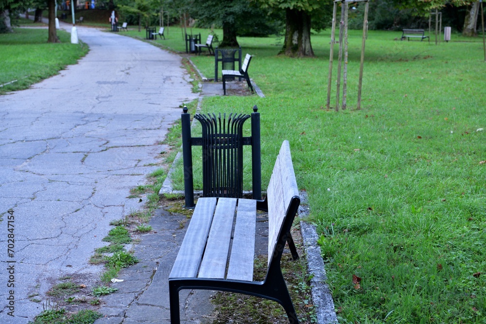 Detail of the rest benches in the spa forest park for visitors