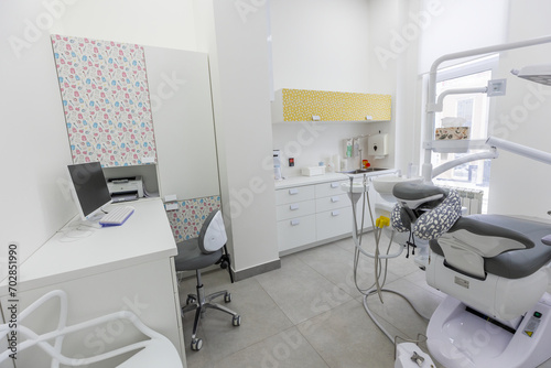 Modern Dental office. equipment at dental office. Dental chair and other accessories. Dental clinic equipment. © SOLOTU