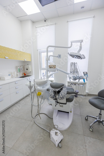 Modern Dental office. equipment at dental office. Dental chair and other accessories. Dental clinic equipment. © SOLOTU