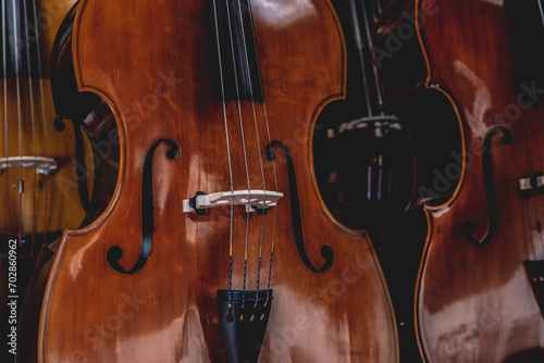 close up of Violins are hanging in retail store to sell