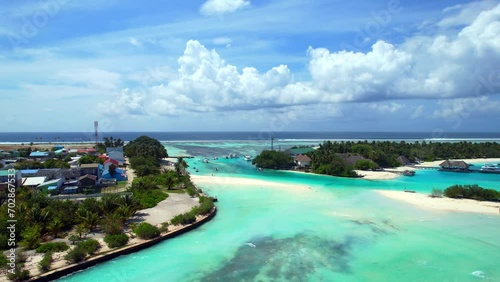 Huraa Island - Maldives - Aerial shot of the beautiful islands in the strait photo