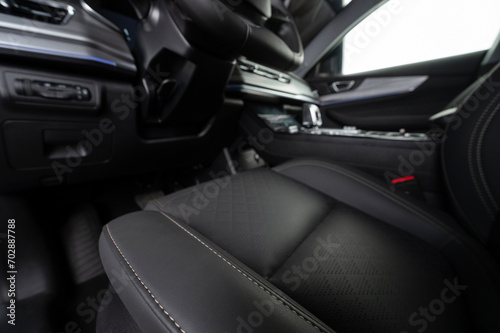 Black leather car driver seat © PixieMe