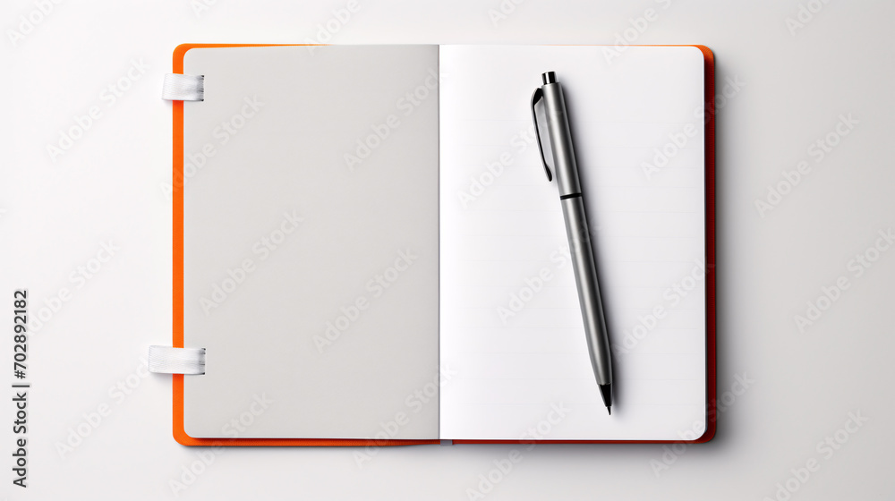 notebook calendar with a pen placed on it
notebook calendar with a pen placed on it