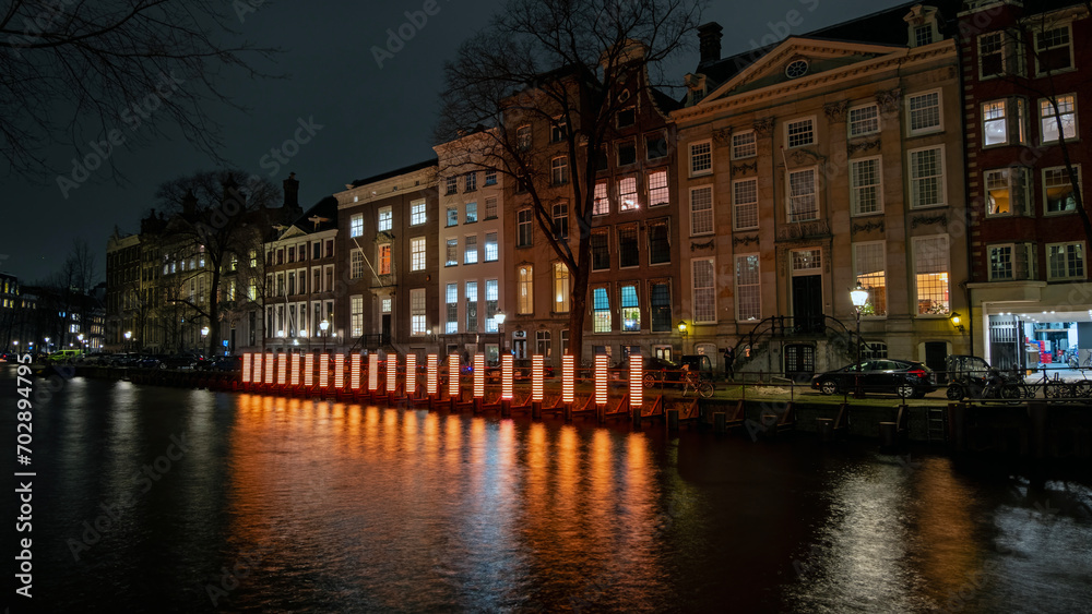Amsterdam, the Netherlands - December 18, 2023: In December and January, the city-center lights up during free Amsterdam Light Festival.