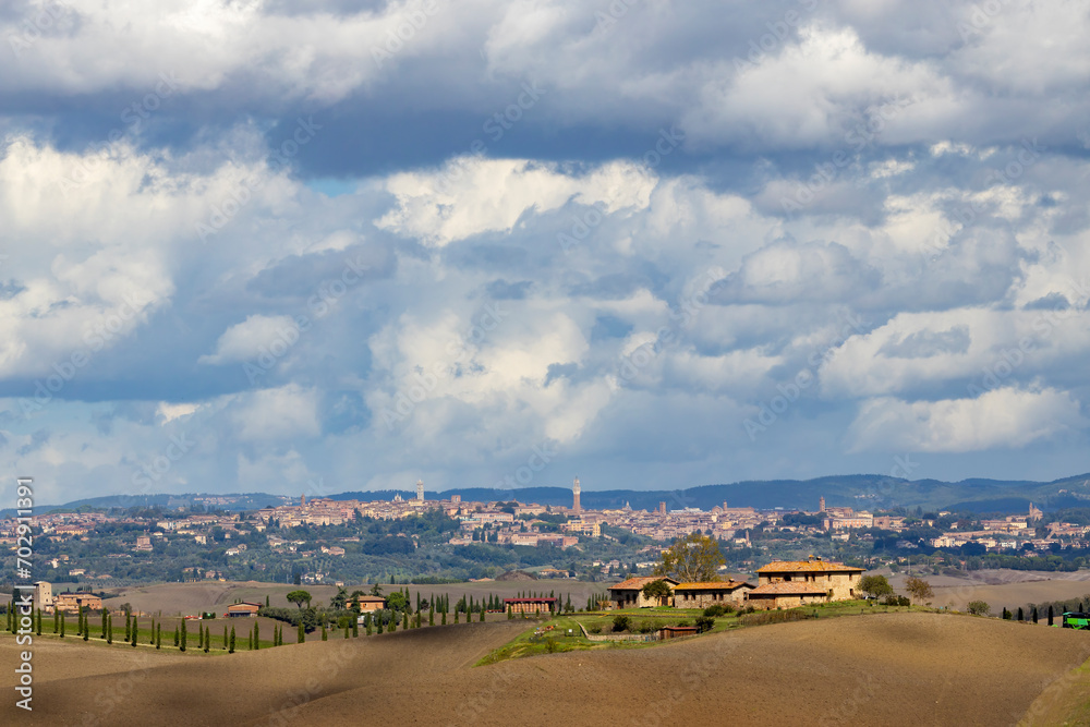 Typical Tuscan landscape withr Siena town, Tuscany, Italy