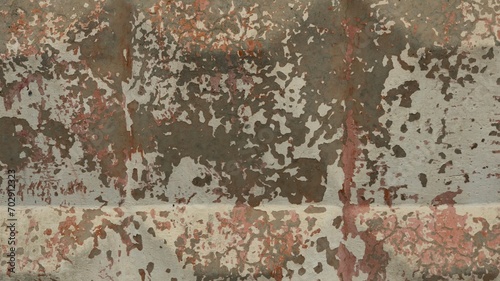 fragment of a concrete fence with a pattern of convex squares with flakes of peeling paint in gray-white-pink tones, a texture background of a shabby surface of a hard material with peeling old paint