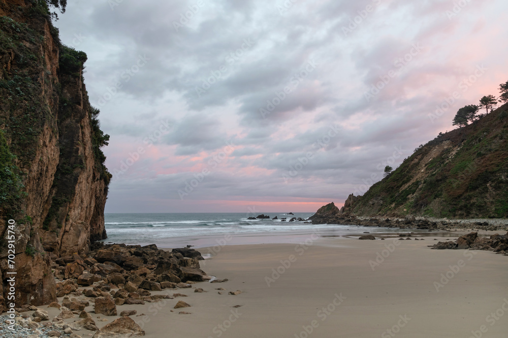 Sunrise at Veneiro Beach. Xilo Beach. Walls of Nalón. The Castle. Asturias Sunrise at Veneiro Beach. Xilo Beach. Walls of Nalón. The Castle. Asturias
