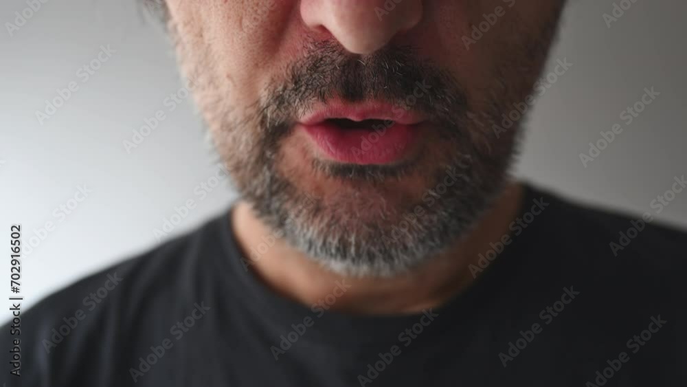Close up of male mouth with crooked teeth talking Close up of male mouth with crooked teeth talking