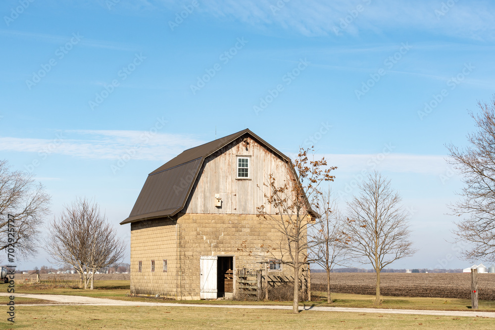 Old weathered wooden barn in rural Livingston county, Illinois, USA.