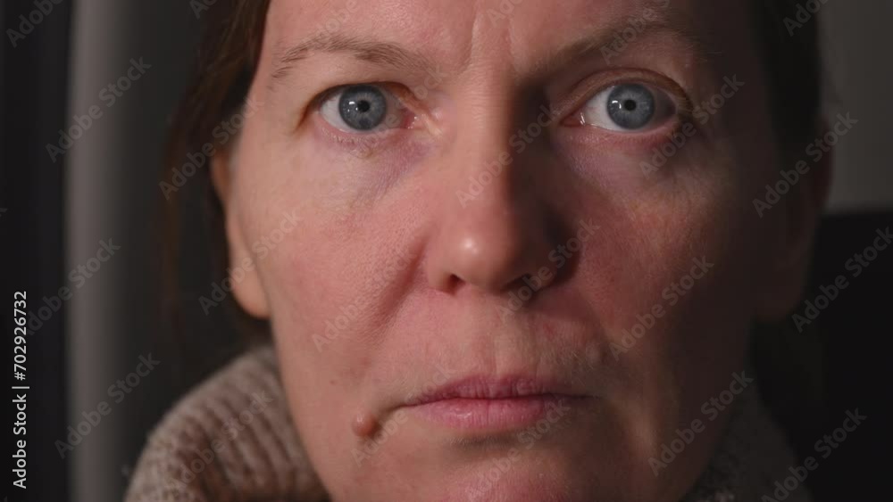 Closeup face portrait of adult caucasian brunette female. Real people with no makeup.