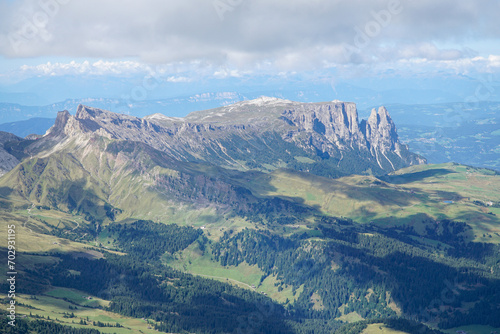 Amazing dolomite panoramic view of Alpe di Siusi, Puez Odles Naturepark upto Sassolungo mountain range in South Tyrol, Italy. 