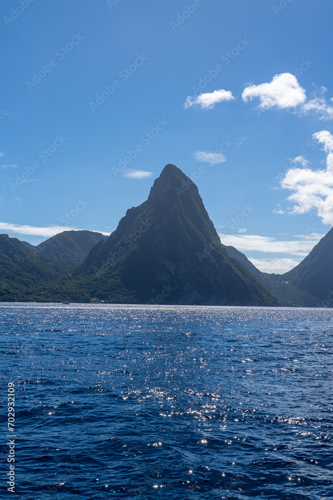 A photo of the Petit Piton in St Lucia on a sunny day as seen from the Caribbean Sea.