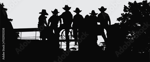 silhouettes of people Sunset at farm Western Cowboys and Cowgirls group standing at farm's fence 