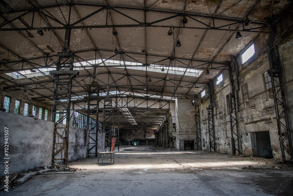 Old, destroyed and abandoned factory, urbex industrial hall.