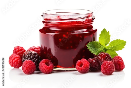 Raspberry jam and berries on white background