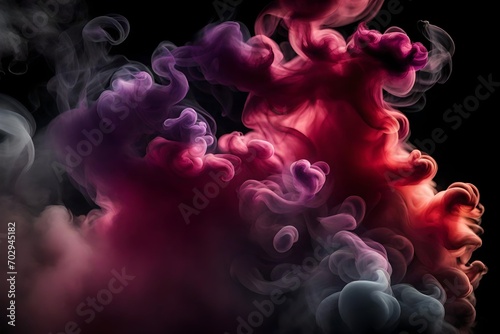 Dense multicolored smoke of red, purple and pink colors on a black isolated background. Background of smoke vape 