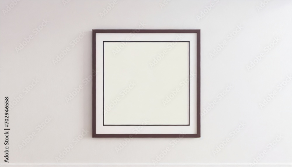 square frame with poster mockup on the white wall front view 3d rendering square frame with poster mockup on the white wall front view 3d rendering