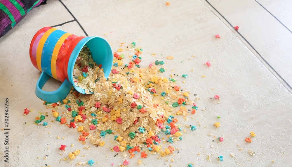 Fototapeta premium kids cereal spilled on floor