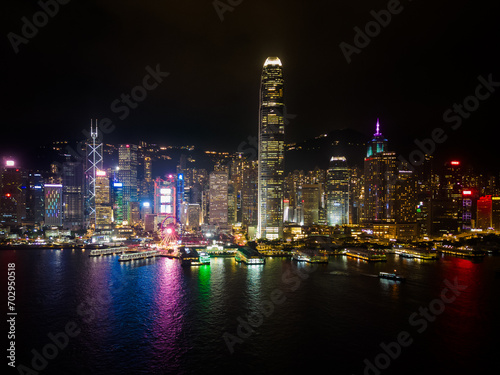 Hong Kong Island skyline at night, Hong Kong skyline from drone, Symphony of Lights, Hong Kong's Symphony of Lights from Tsim Shai Tsui promenade.  © Yuxiao