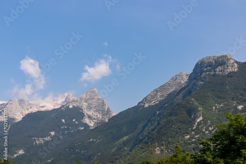 Panoramic view of mount Vrh Jerebceve police and Monte Forato seen from Bovec, Julian Alps, Slovenia Jagged contours of majestic mountain peaks in Soca valley. Wanderlust hiking in wild Slovenian Alps