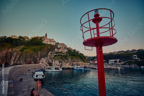 Verbenico, medieval village on the island of Krk in Croatia at sunset photo