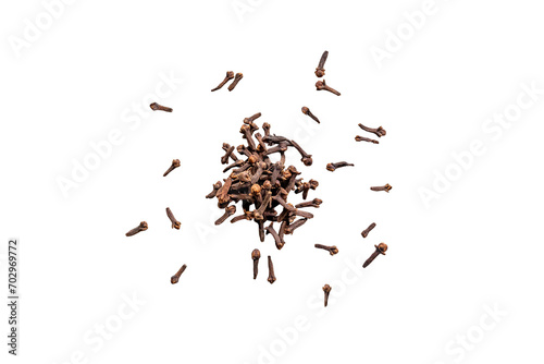 Closeup of organic dry spice cloves isolated on a transparent without shadows background from above, top view photo