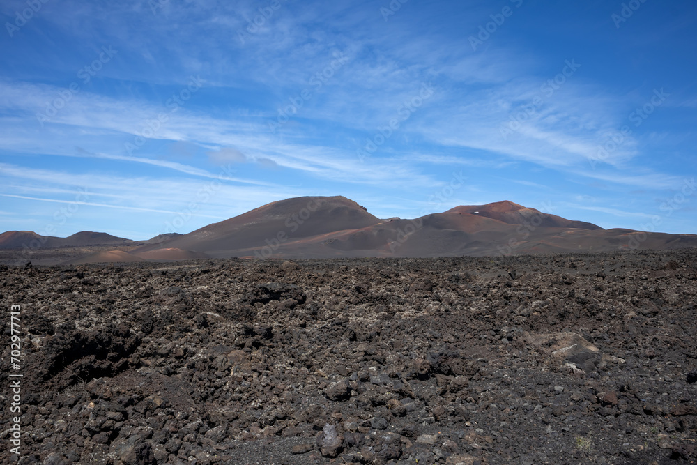 Volcanic soil and a mountain, Lanzarote, Spain