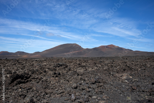 Volcanic soil and a mountain  Lanzarote  Spain