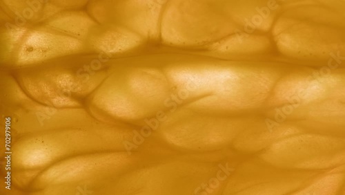 Orange fruit with water close-up macro. Slice of fresh exotic orange fruit texture background . Health fruits concept.