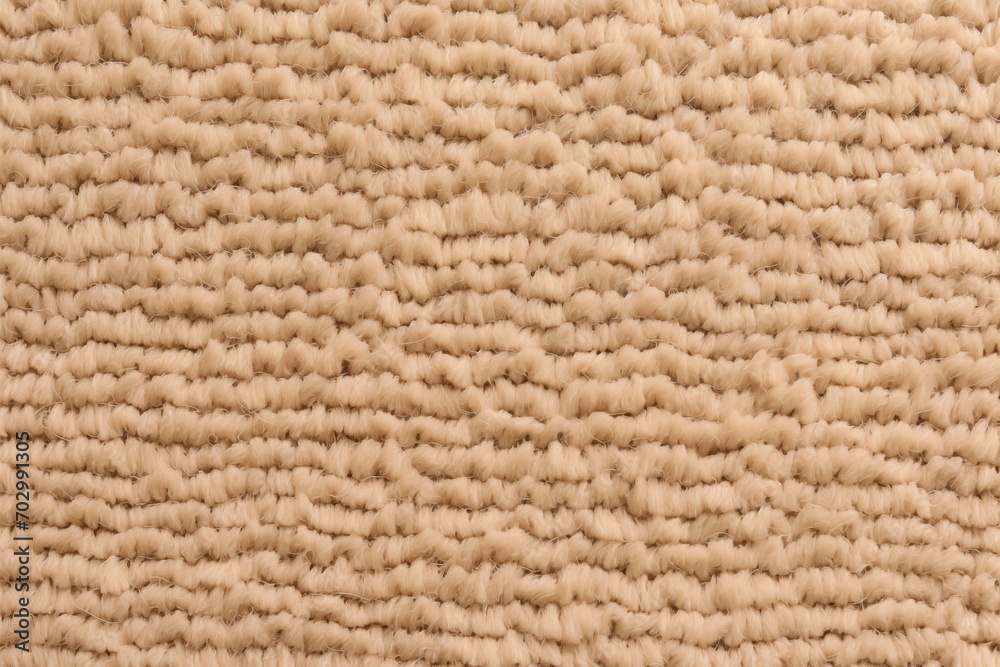 Textured background of a light beige carpet in close-up Textured background of a light beige carpet in close-up