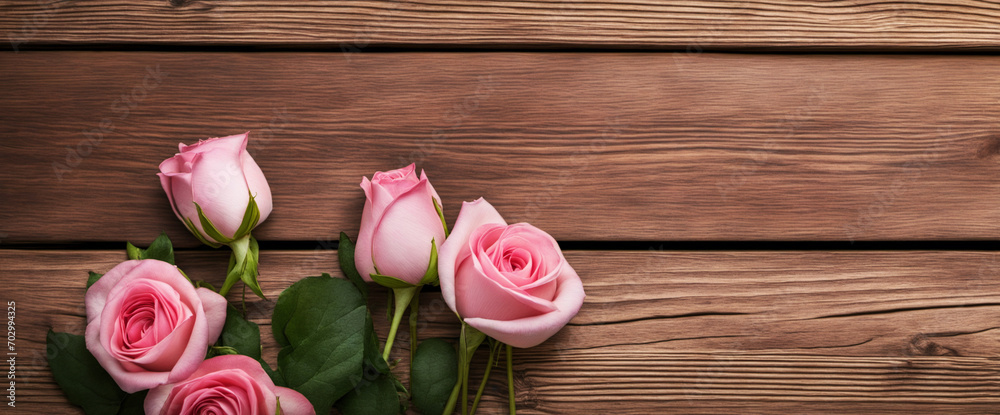 Romantic setting with pink roses and wooden hearts, perfect for your message