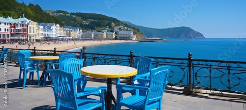 Coastal promenade with cafes  umbrellas  and bicycles for outdoor dining and leisure activities