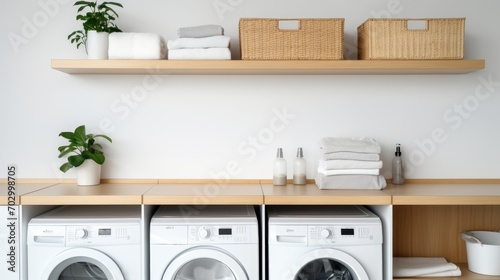 Modern and functional laundry room with washing maching,  shelves and storage space