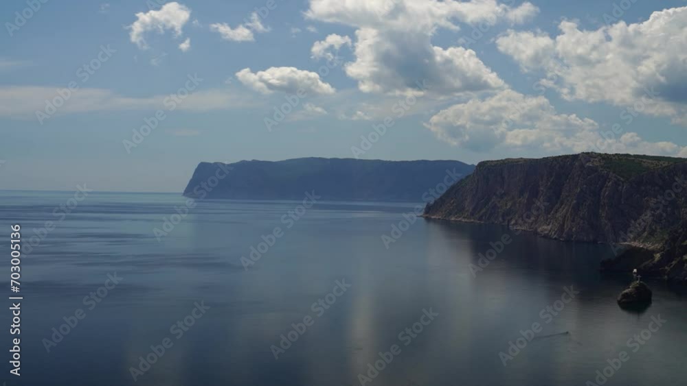 Time lapse clouds moving in blue sky over calm sea. Abstract aerial nature sky background. Vacation, travel concept. cloudscape traveling over a wide space of nature clear sky. Time lapse clouds moving in blue sky over calm sea. Abstract aerial nature sky background. Vacation, travel concept. cloudscape traveling over a wide space of nature clear sky.