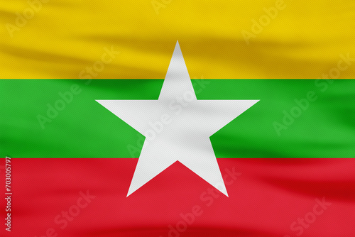 Myanmar Flag - Yellow, Green, Red Stripes and White Star photo