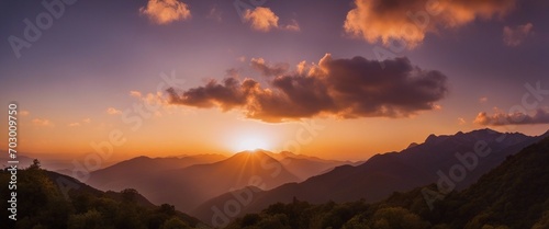 Sunrise Over a Mountain Range A panoramic time-lapse image capturing the gradual lighting change