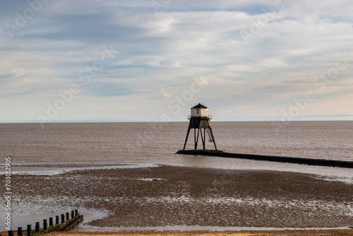 Lighthouse in the sea, Dovercourt low lighthouse at low tide built in 1863 and discontinued in 1917 and restored in 1980 the 8 meter lighthouse is still a iconic sight